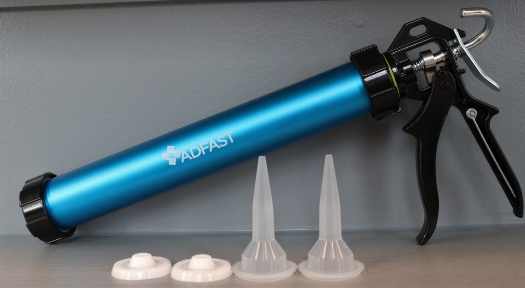 New Caulking Gun ADFAST CORP